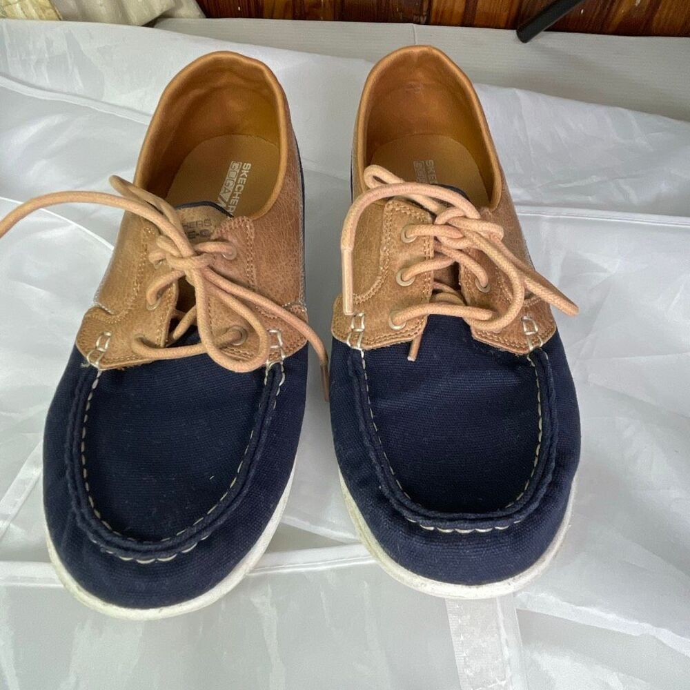 Skechers size 9.5 Woman’s GOwalk Lite- Isla boat shoes canvas leather